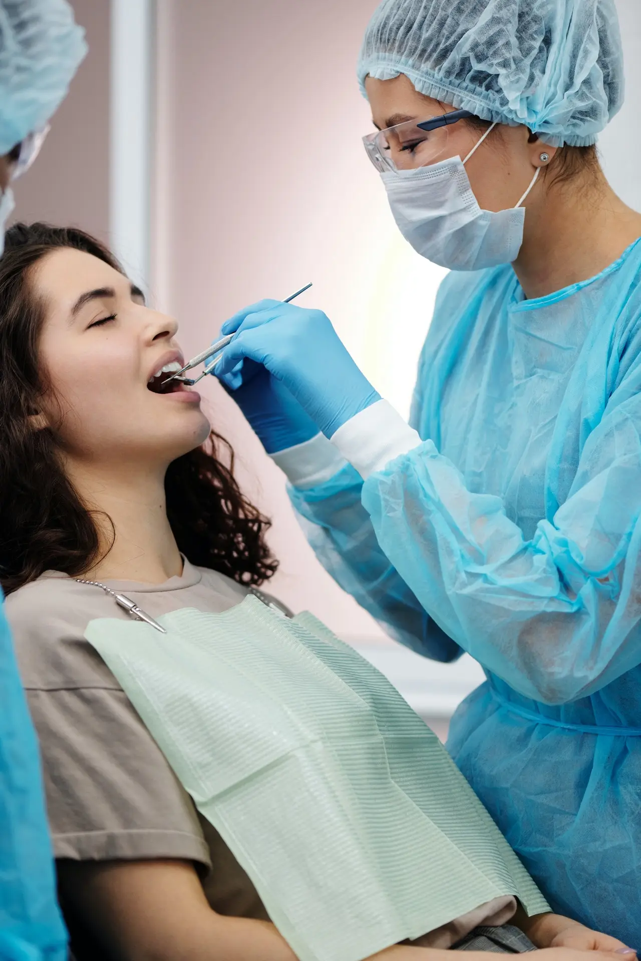 doctor placing Dental Crowns