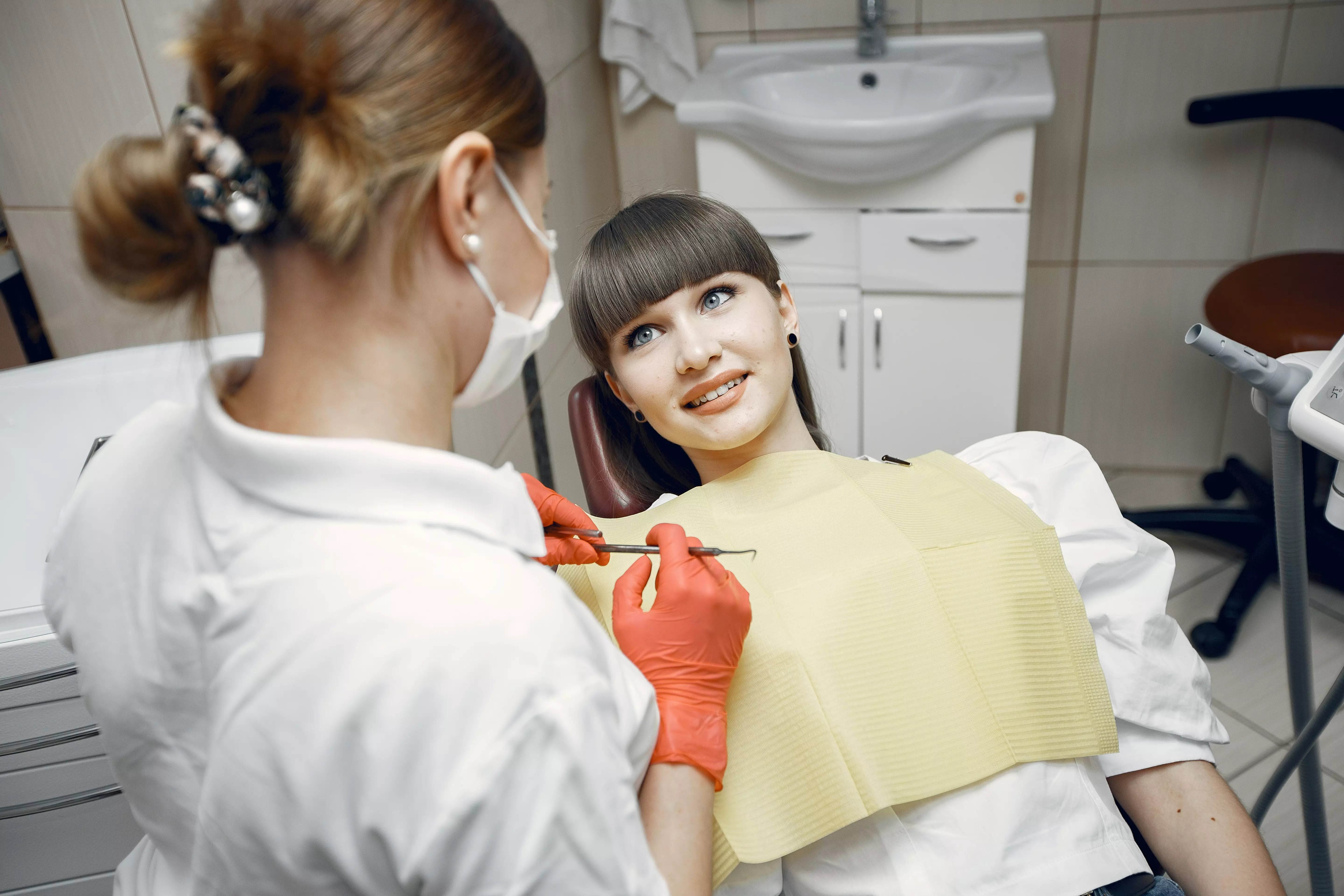 lady in dental office for Narrow Smile